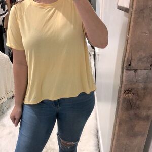 JOYLAB size medium yellow open back athletic top
